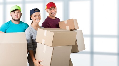 Loading furniture into a removals van in South Kensington