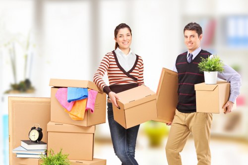 Packed office boxes and furniture ready for relocation