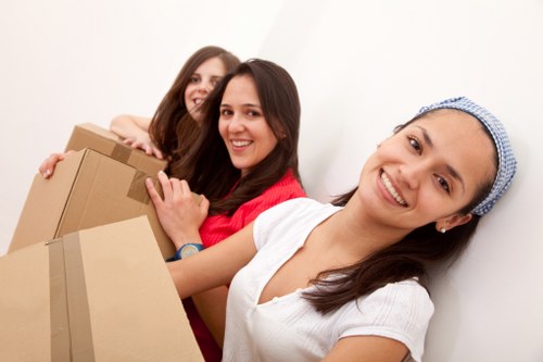 Removal team handling boxes safely at the start of a move