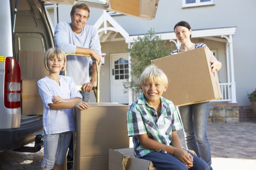 Removal workers securing items in a vehicle for safe transport