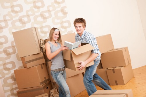 Packed IT equipment and workplace items ready for transport during a commercial move