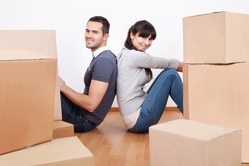 Local movers handling boxes for a flat move in South Kensington